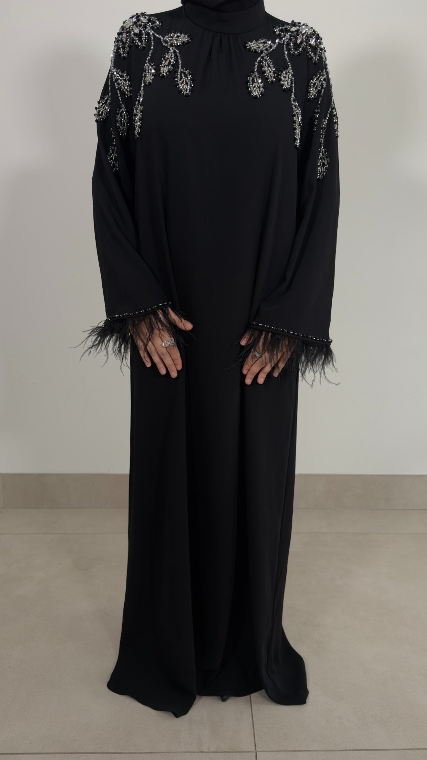 Black embellished feather sleeve dress