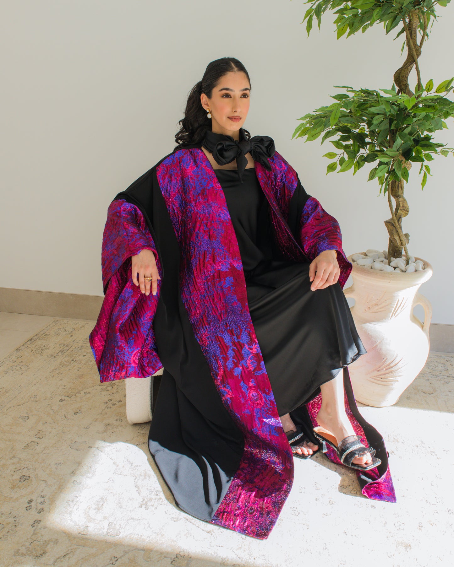 Hot pink and black brocade abaya with wide sleeves
Modest abaya