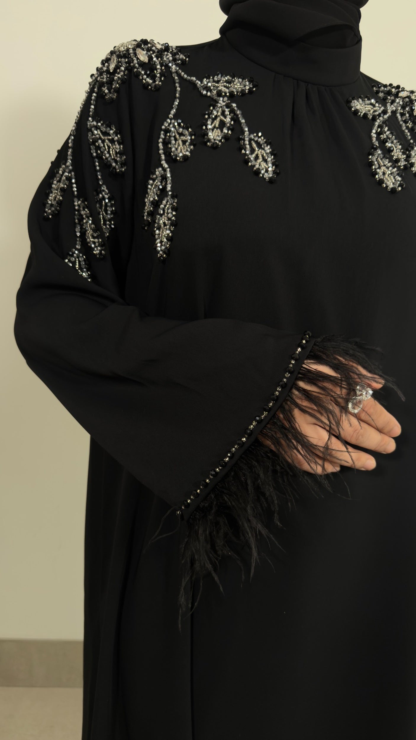 Black embellished feather sleeve dress